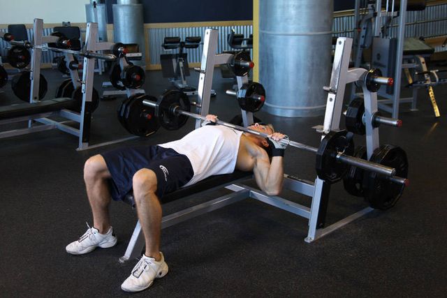 Barbell Guillotine Bench Press: finishing position
