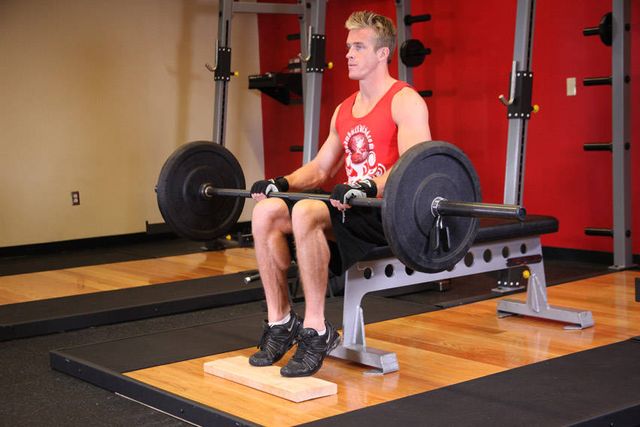 Barbell Seated Calf Raise: finishing position