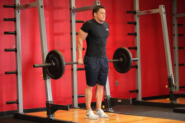 Barbell Shrug Behind The Back: finishing position