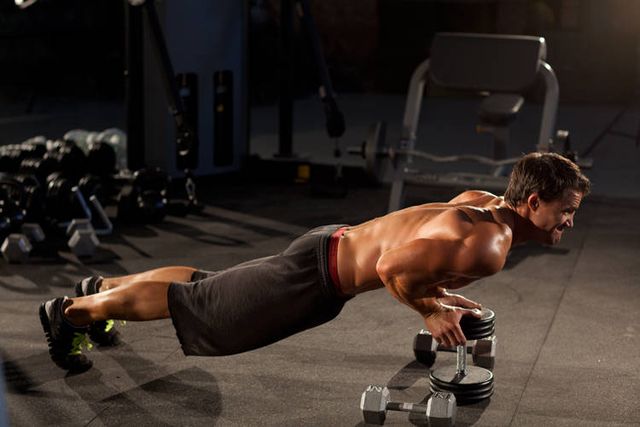 Close-Grip Push-Up off of a Dumbbell: finishing position