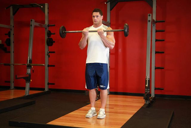 Close-Grip Standing Barbell Curl: finishing position