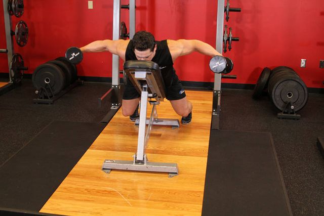 Dumbbell Lying Rear Lateral Raise: finishing position
