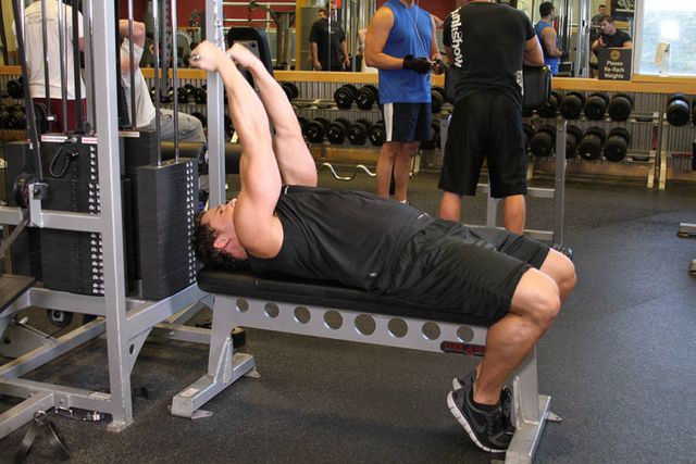 High Cable Curls: starting position