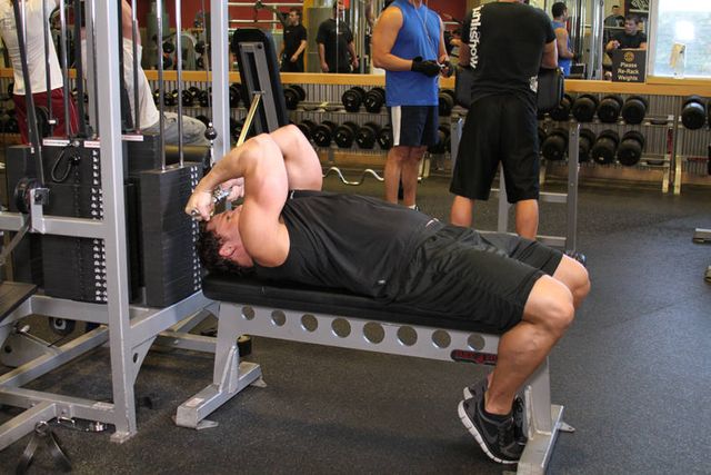 High Cable Curls: finishing position