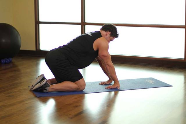 Kneeling Forearm Stretch: finishing position