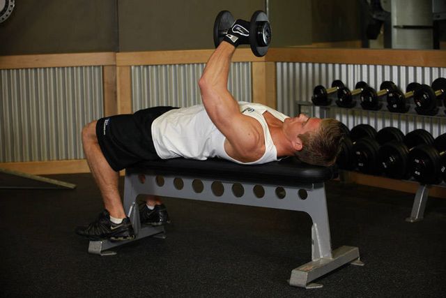 One-Arm Flat Bench Dumbbell Flye: finishing position