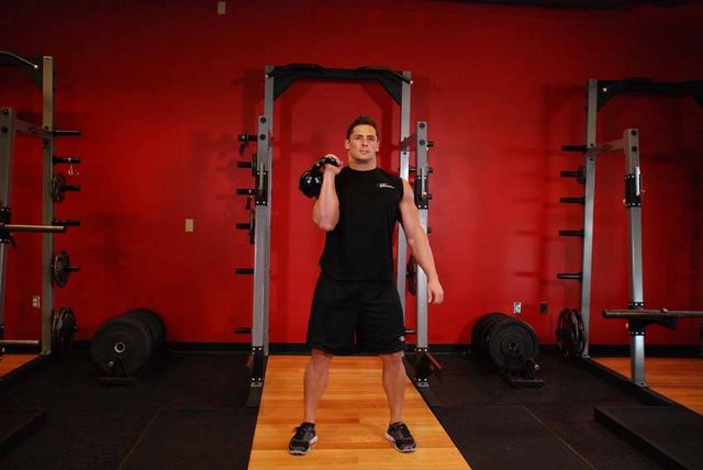 One-Arm Kettlebell Clean and Jerk: finishing position