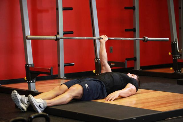 One Arm Floor Press: finishing position