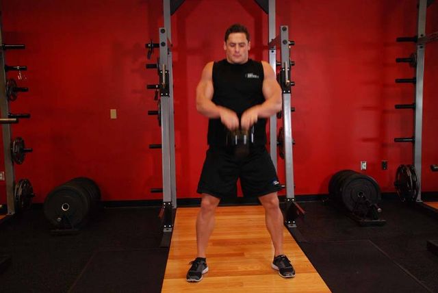 Open Palm Kettlebell Clean: finishing position