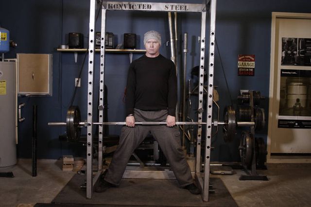 Reverse Band Sumo Deadlift: finishing position