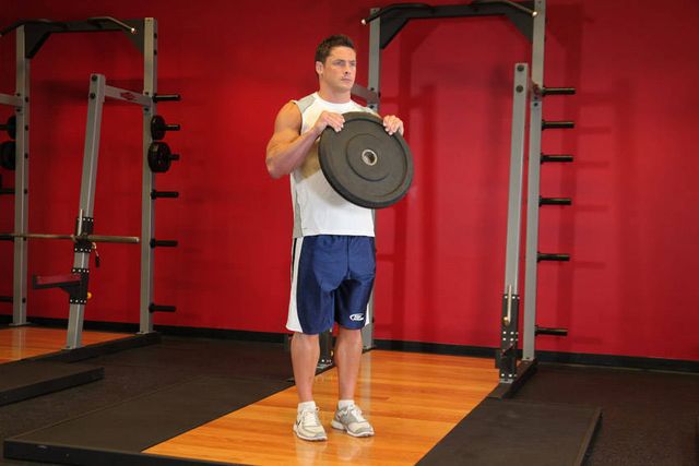 Reverse Plate Curls: finishing position