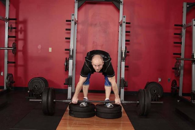 Romanian Deadlift from Deficit: finishing position