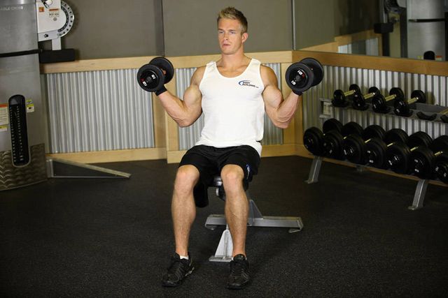 Seated Dumbbell Inner Biceps Curl: finishing position