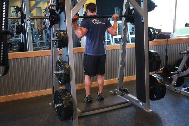 Smith Machine Reverse Calf Raises: finishing position