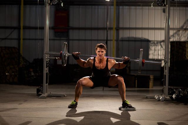 Squat with Plate Movers: finishing position