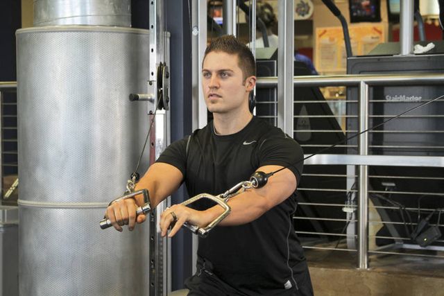 Standing Cable Chest Press: finishing position