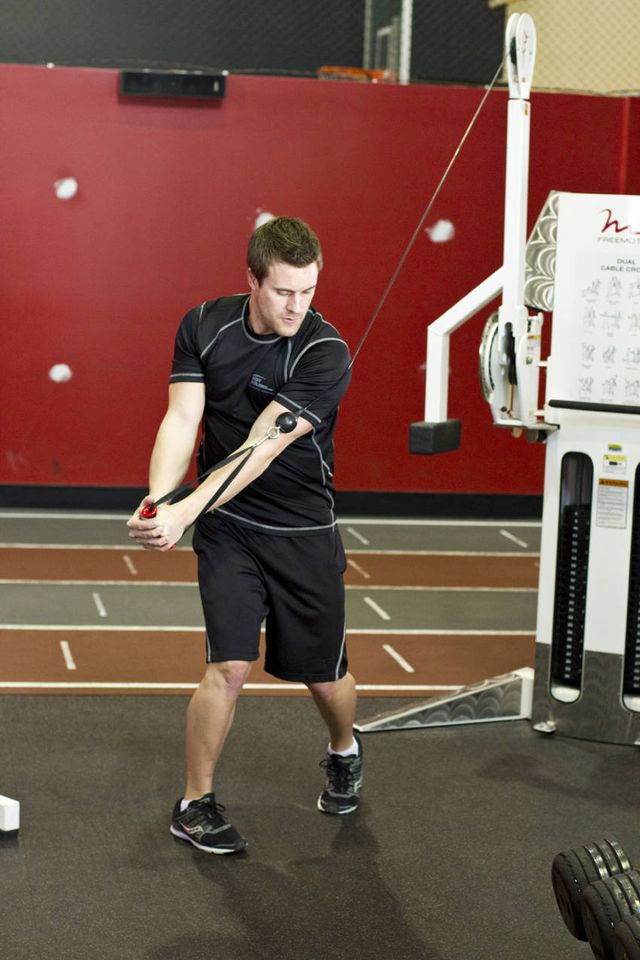 Standing Cable Wood Chop: finishing position