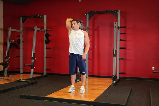 Standing One-Arm Dumbbell Triceps Extension: finishing position
