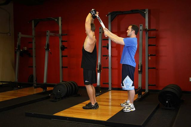 Standing Towel Triceps Extension: finishing position