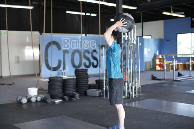 Standing Two-Arm Overhead Throw: finishing position