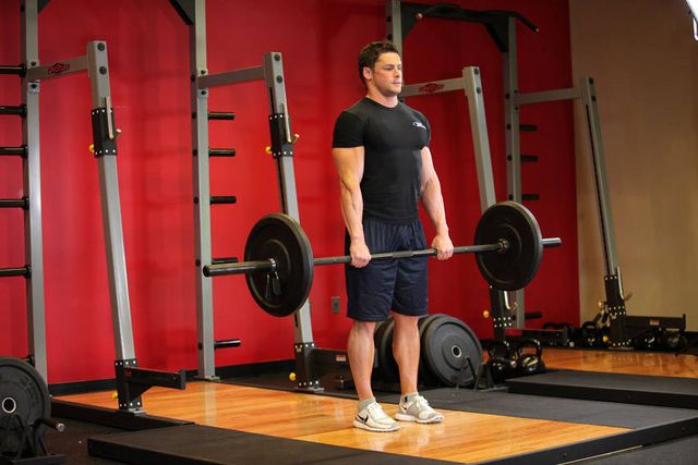Stiff-Legged Barbell Deadlift: finishing position