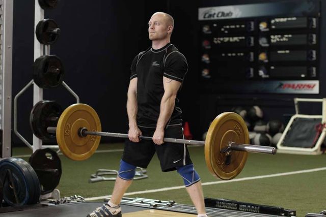 Wide Stance Stiff Legs: finishing position